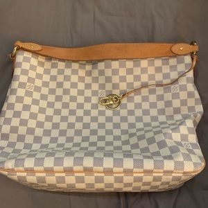 Louis Vuitton shoulder bag and wallet set
